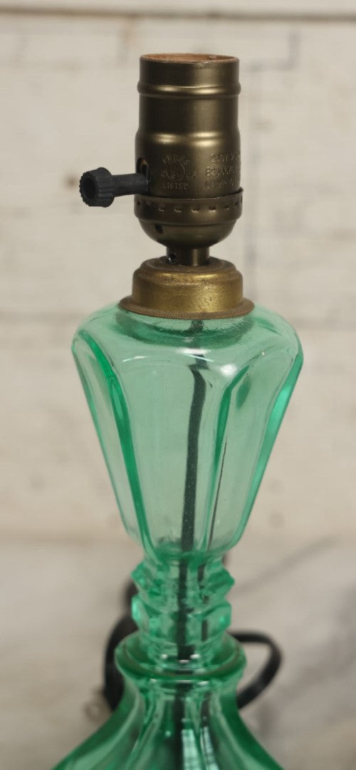 Lot 074 - Antique Uranium Glass Oil Lamp Converted To Electric Lamp, U.V. Black Light Reactive, Rewired With New Bulb Socket