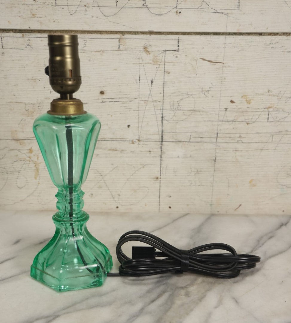 Lot 074 - Antique Uranium Glass Oil Lamp Converted To Electric Lamp, U.V. Black Light Reactive, Rewired With New Bulb Socket