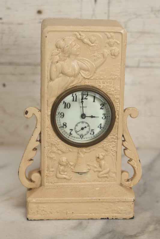 Lot 075 - Antique Wind Up 8-Day Clock With Woman And Cherubs, Roses, Painted Over White, Non Working