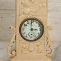 Lot 075 - Antique Wind Up 8-Day Clock With Woman And Cherubs, Roses, Painted Over White, Non Working