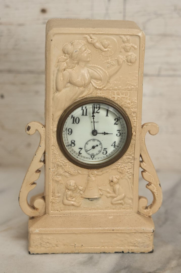 Lot 075 - Antique Wind Up 8-Day Clock With Woman And Cherubs, Roses, Painted Over White, Non Working