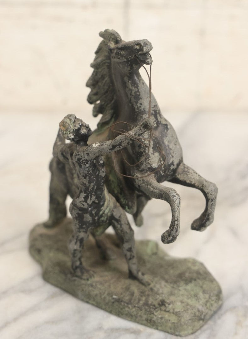 Lot 076 - Antique Spelter Metal Statue Of Man Holding Reins Of Rearing Horse, Various Wear, Paint Chipping