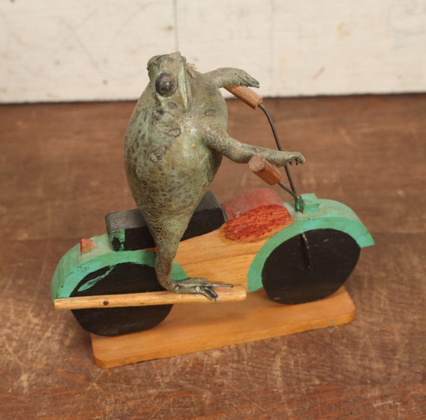 Lot 004 - Vintage Mexican Folk Art Taxidermy Frog Riding A Motorcycle