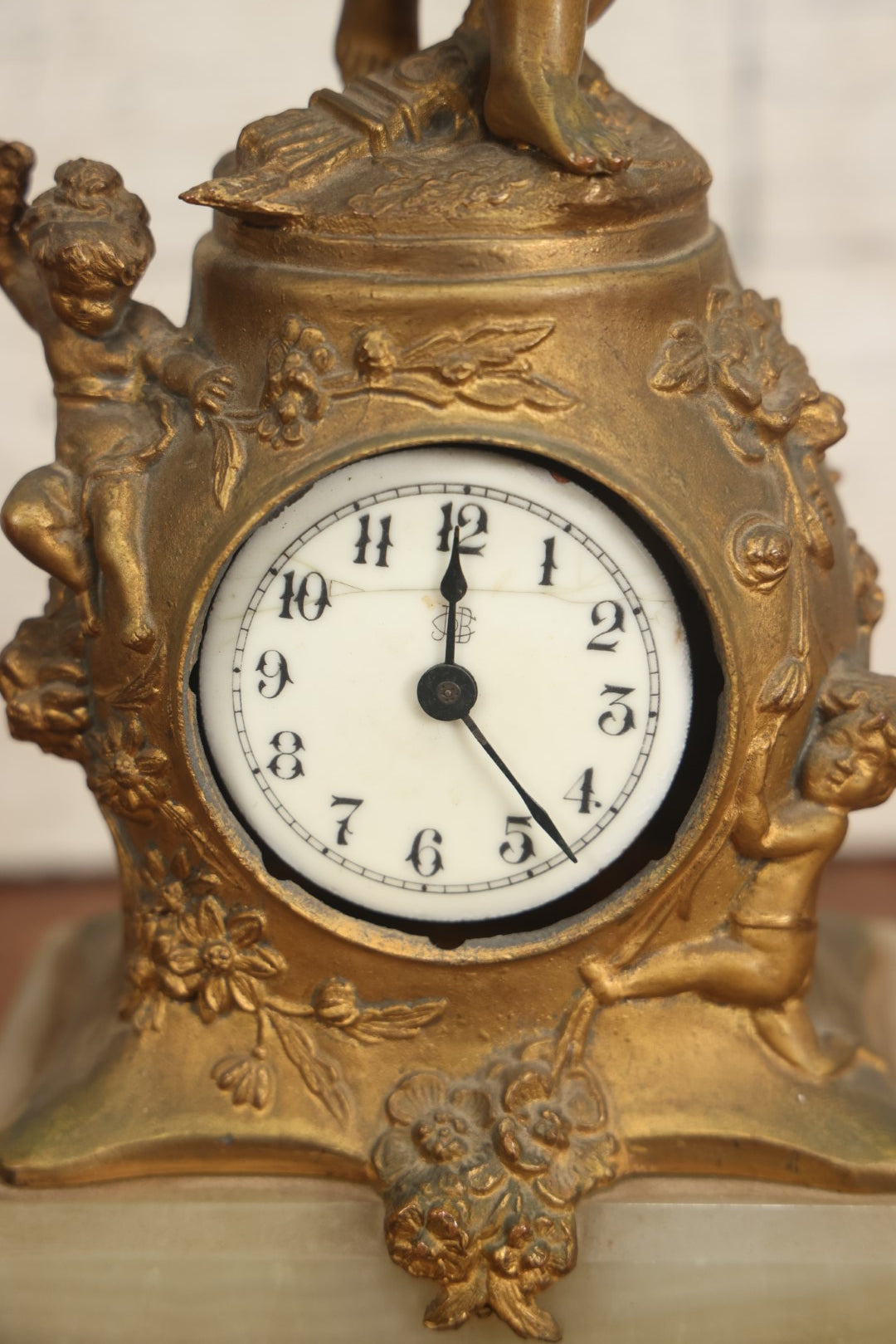 Lot 008 - Antique Decorative Clock With Cast Metal Cupid Figural Statue, By The Jennings Brothers, Bridgeport, Connecticut, Not Functioning