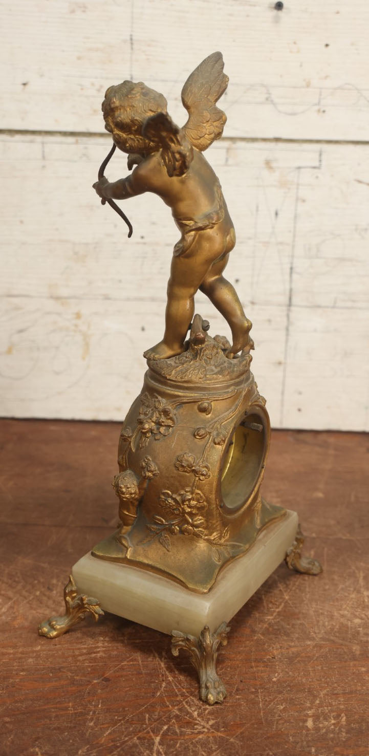 Lot 008 - Antique Decorative Clock With Cast Metal Cupid Figural Statue, By The Jennings Brothers, Bridgeport, Connecticut, Not Functioning