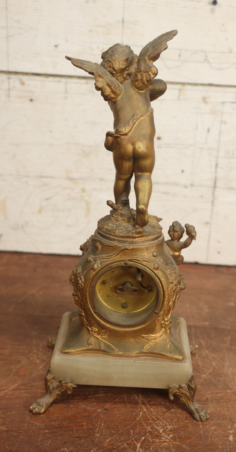 Lot 008 - Antique Decorative Clock With Cast Metal Cupid Figural Statue, By The Jennings Brothers, Bridgeport, Connecticut, Not Functioning