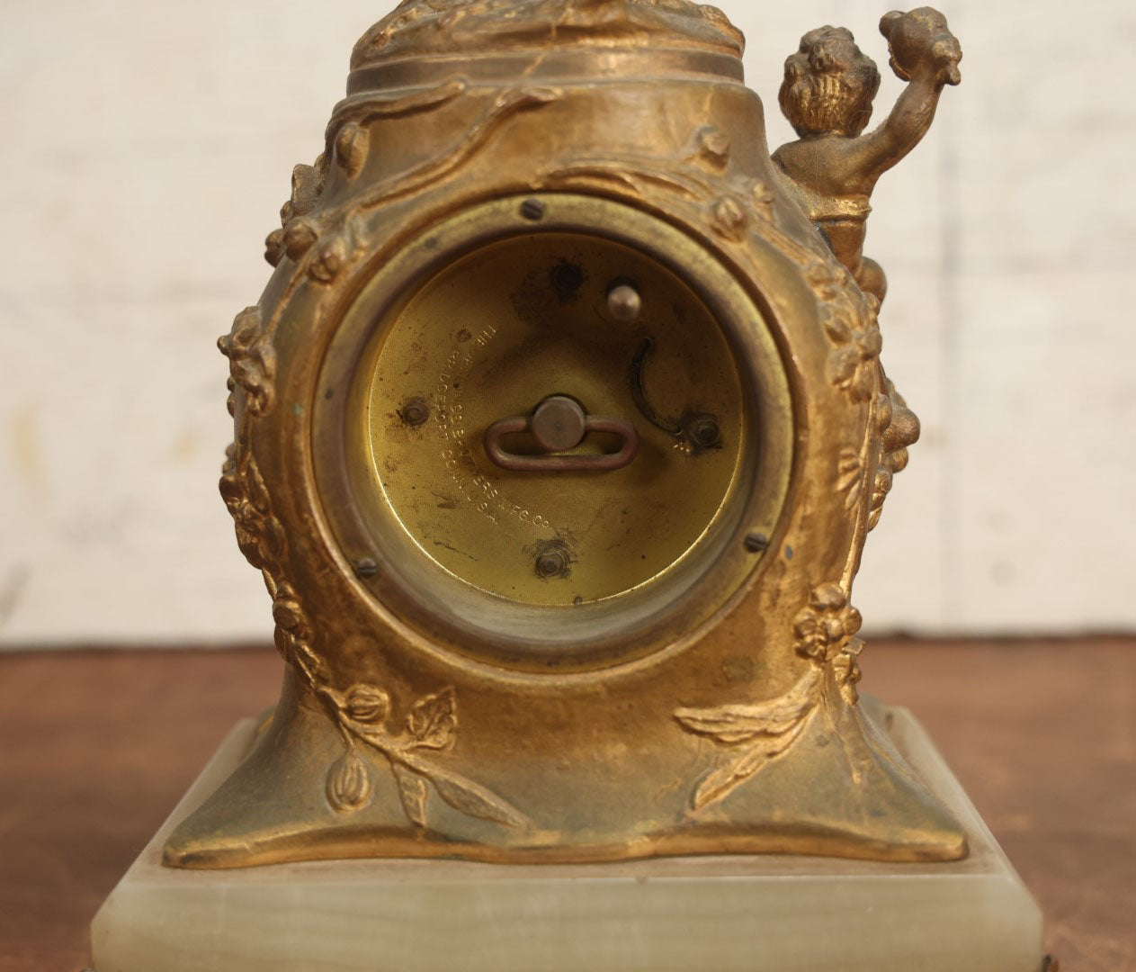 Lot 008 - Antique Decorative Clock With Cast Metal Cupid Figural Statue, By The Jennings Brothers, Bridgeport, Connecticut, Not Functioning