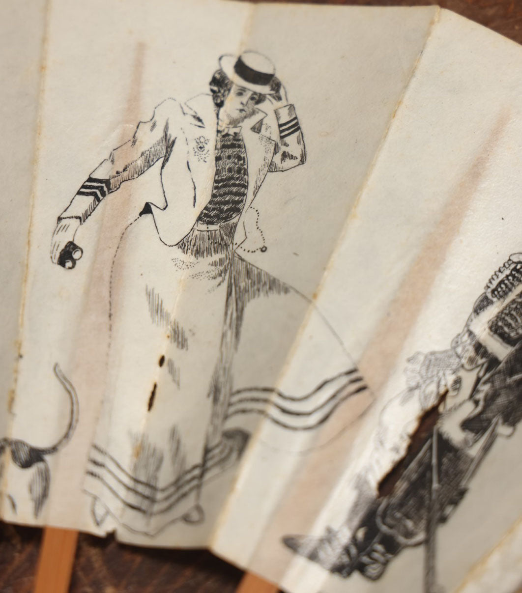 Lot 009 - Antique Varnished Paper Hand Fan With Original Pen And Ink Illustrations Of Many Characters, Actor With Skull, Woman With Dogs, Horse Riders, And More, Two Artist Signatures, Dated 1900