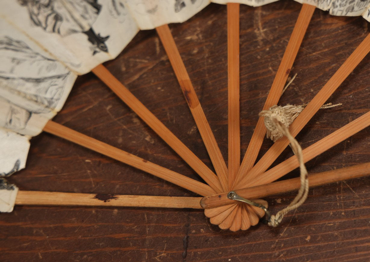 Lot 009 - Antique Varnished Paper Hand Fan With Original Pen And Ink Illustrations Of Many Characters, Actor With Skull, Woman With Dogs, Horse Riders, And More, Two Artist Signatures, Dated 1900