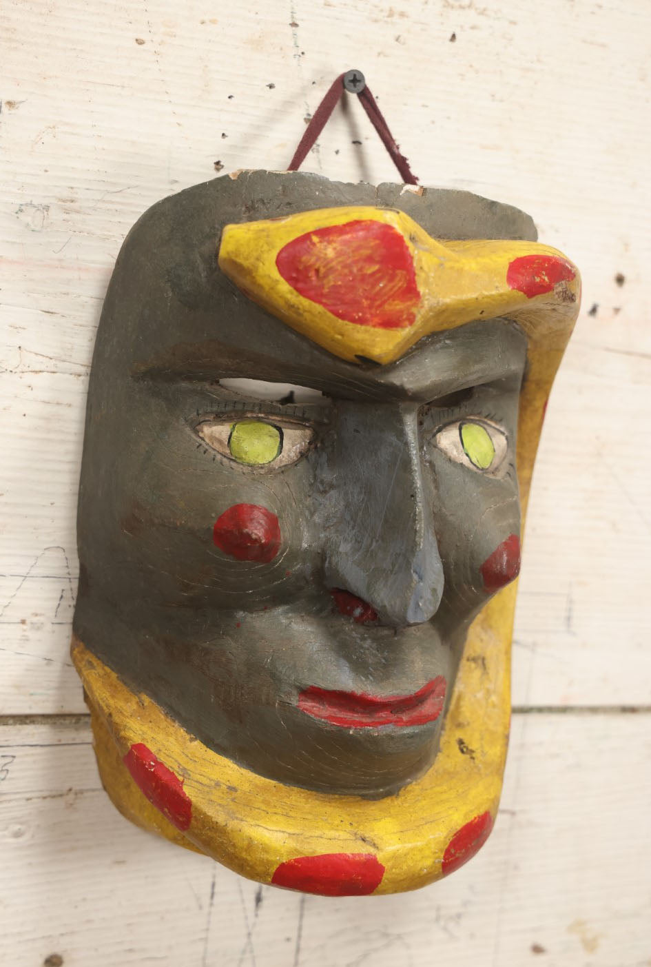 Lot 016 - Vintage Mexican Folk Art Carved Wooden Mask Of A Gray Face With A Snake Wrapped Around It, Wall Hanger, Green Eyes