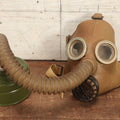 Lot 017 - Vintage Child's Sized Rubber Gas Mask, Various Markings