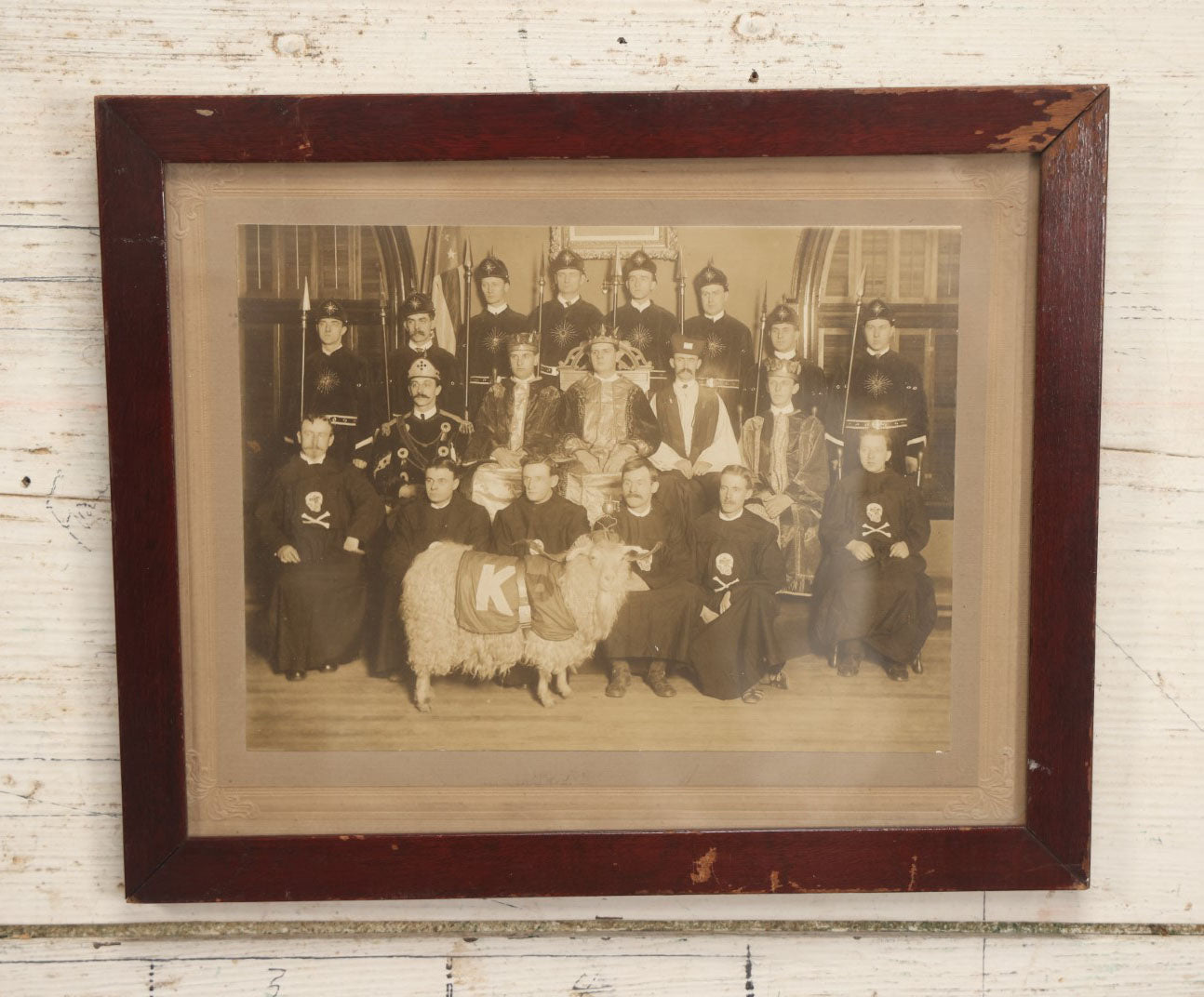 Lot 020 - Antique Boarded Group Photo, Fraternal Gathering, Likely Knights Of Pythias, With Goat And Skull And Crossbones Scene Bearers Robes, In Frame, 11-1/4" x 9-1/4"