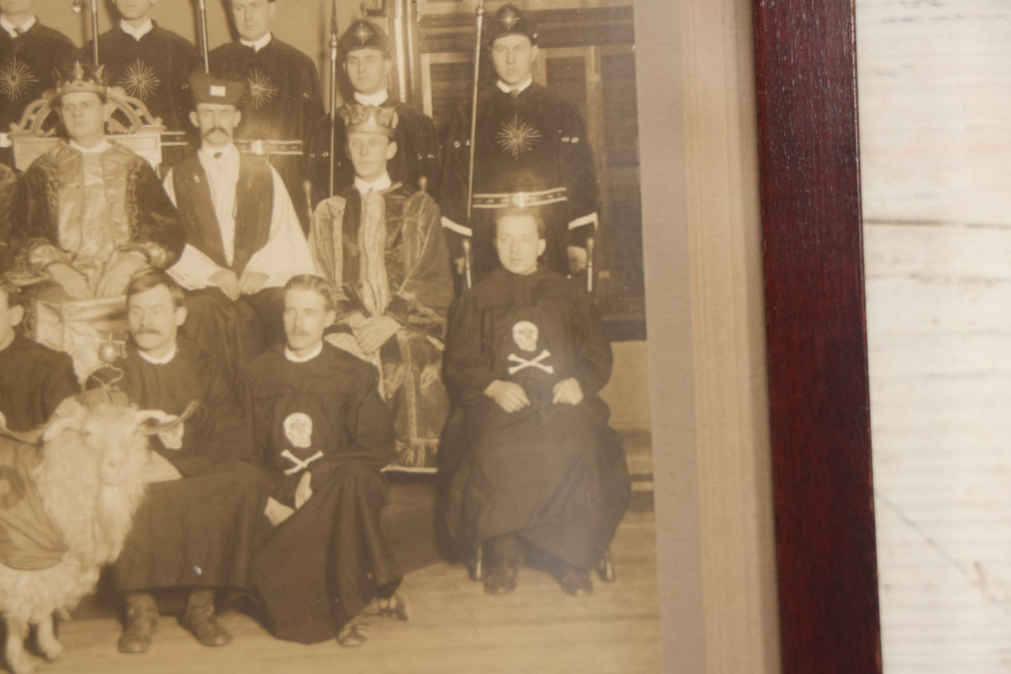 Lot 020 - Antique Boarded Group Photo, Fraternal Gathering, Likely Knights Of Pythias, With Goat And Skull And Crossbones Scene Bearers Robes, In Frame, 11-1/4" x 9-1/4"