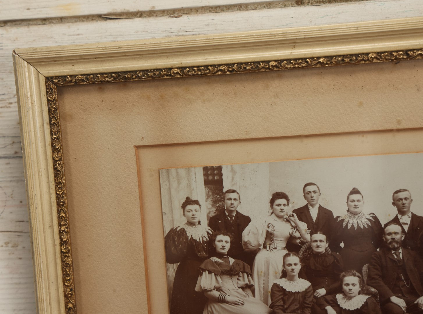 Lot 031 - Antique Late 19th Century Group Photo Of Well Dressed People, Four Men, Eight Women, Boarded And Framed, Note Water Damage To Mat