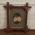 Lot 036 - Antique Boarded Oval Photo Of Two Babies, Likely Twins, In A Carved Oak Leaf Frame