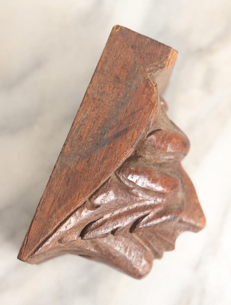 Lot 038 - Small Antique Hand Carved Three Dimensional Wooden Green Man Face Block Furniture Fragment