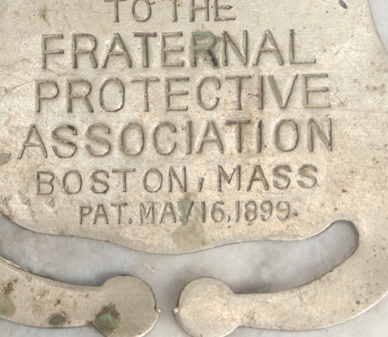 Lot 040 - Antique Fraternal Protective Association Identity Belt Tag, Boston, Massachusetts, 1899, With Number To Telegraph In Case Of Emergency