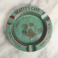 Lot 041 - "I Came From Beatty's Cafe" Spinning Tin Lithographed Tip Tray Coaster, Burlington Colorado