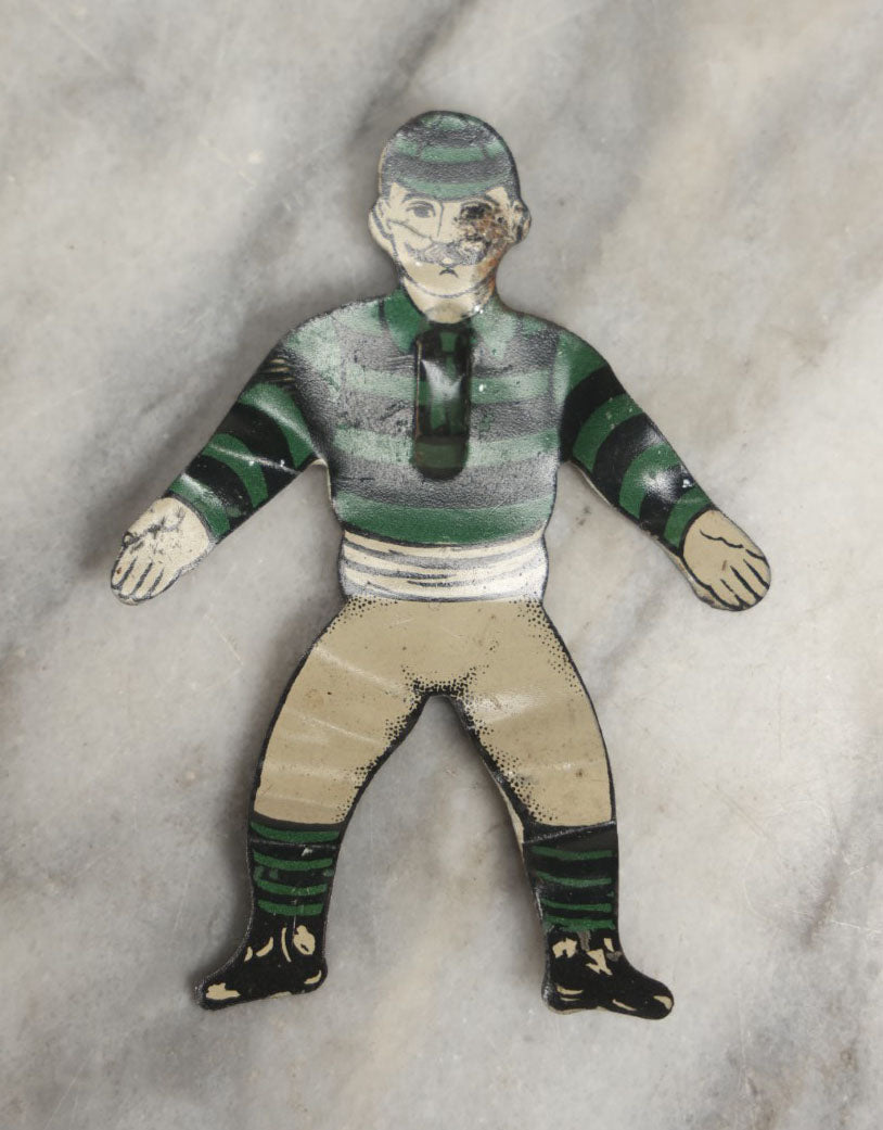 Lot 043 - Grouping Of Four Vintage Tin Lithograph Metal Football Player Game Pieces From Blow Football, Circa 1930