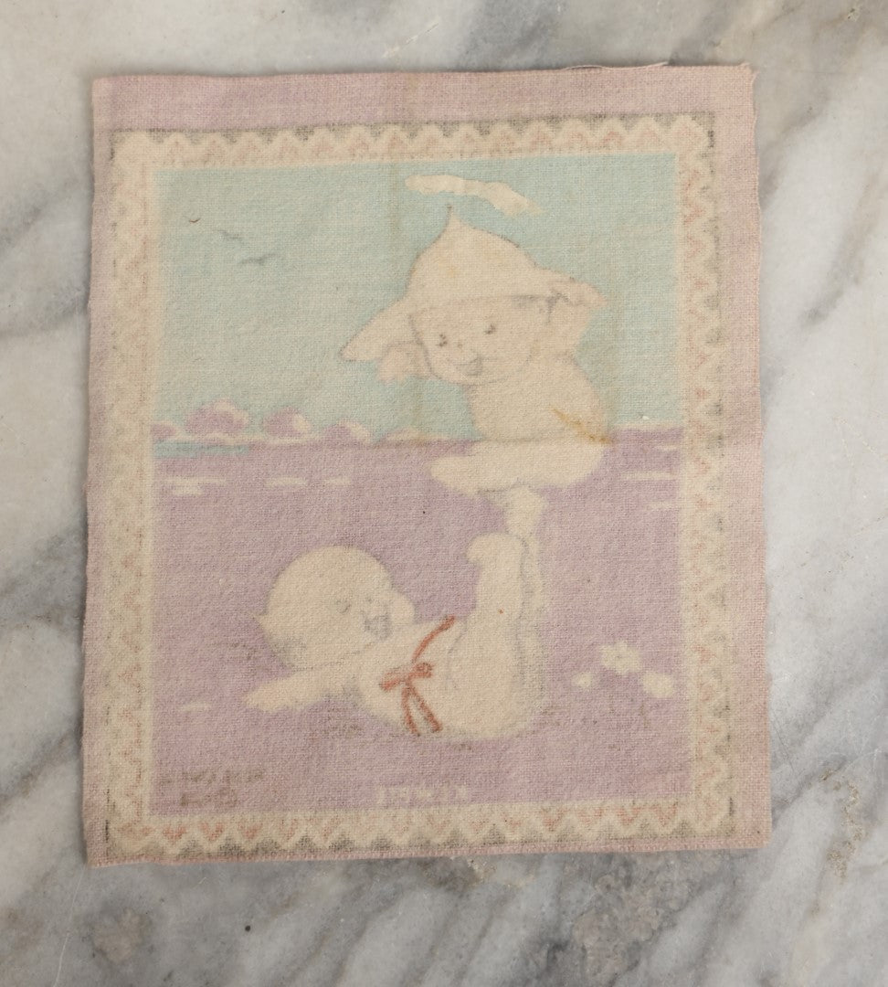 Lot 044 - Antique Original Rose O'Neill Kewpie Doll Tobacco Felt Rug, Dated 1914, Kewpie Balancing On Kewpie's Feet