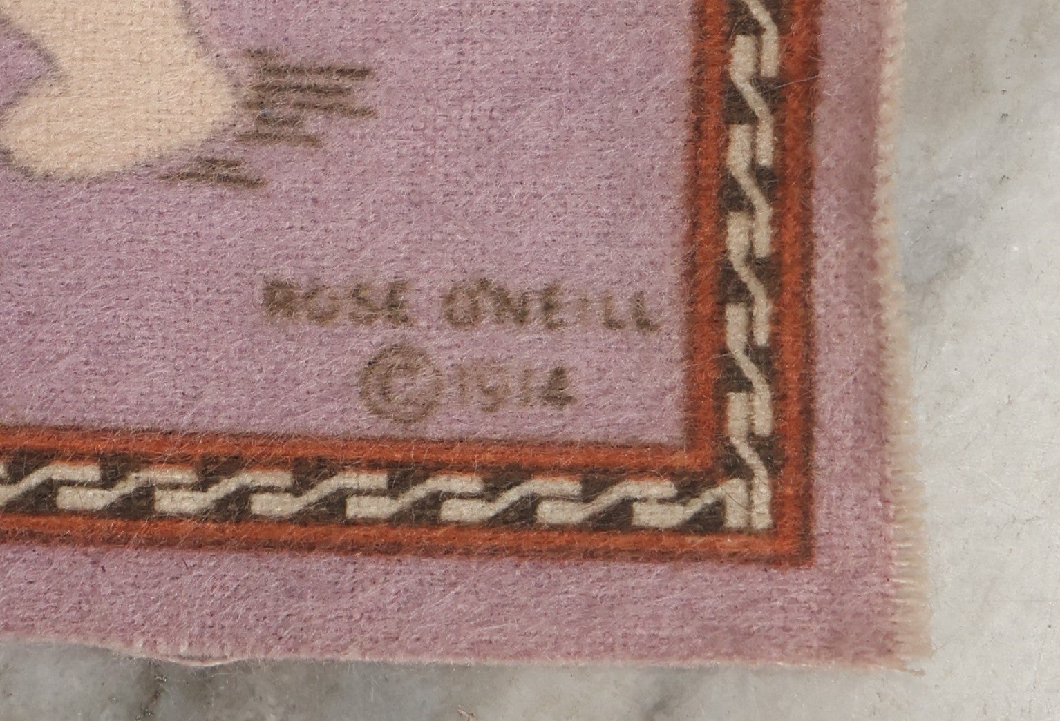 Lot 045 - Antique Original Rose O'Neill Kewpie Doll Tobacco Felt Rug, Dated 1914, Kewpie Jumping Over Kewpie