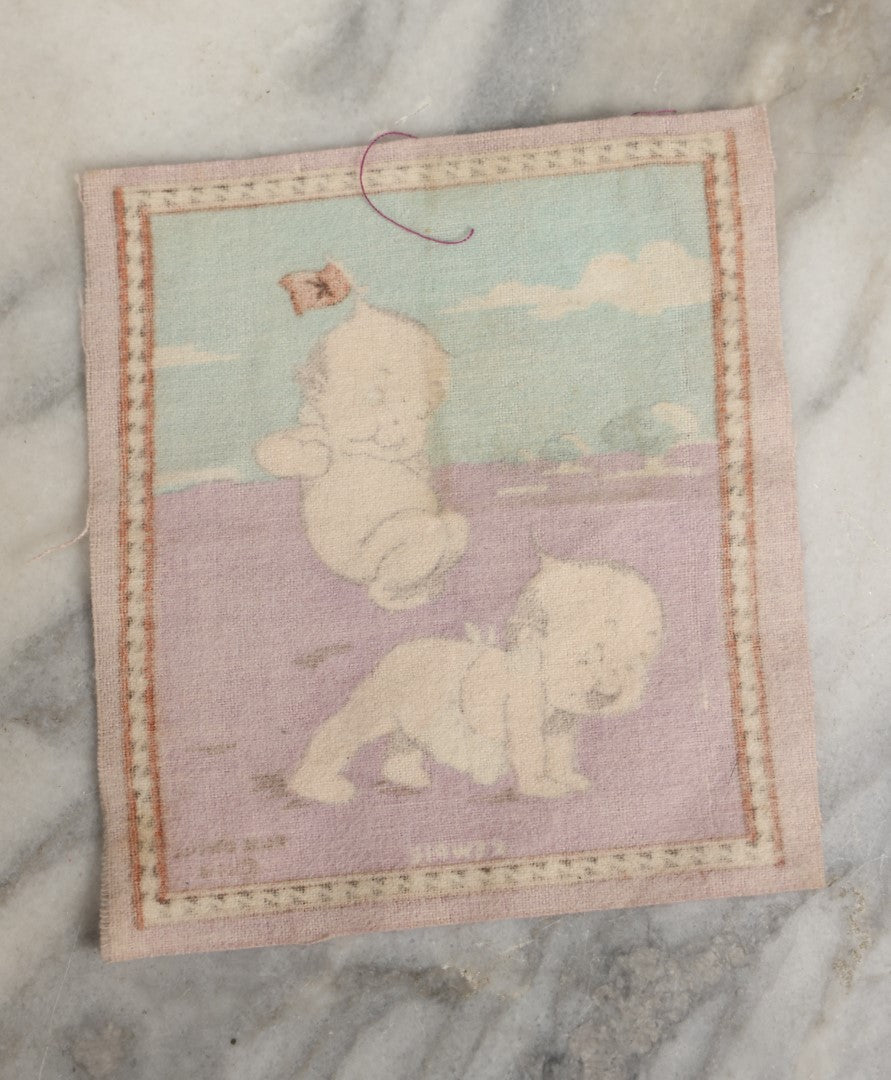 Lot 045 - Antique Original Rose O'Neill Kewpie Doll Tobacco Felt Rug, Dated 1914, Kewpie Jumping Over Kewpie