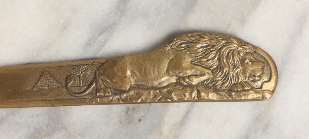 Lot 047 - Vintage Cast Brass Crouching Lion Letter Opener With Pyramid, Palm Tree, Egyptian Revival