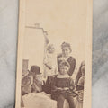 Lot 065 - Single Crudely Cut And Mounted Antique Carte De Visite C.D.V. Photograph Of A Group Of People And A Man Holding Two Cats