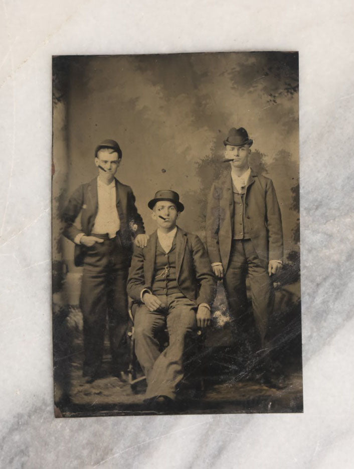 Lot 067 - Single Antique Tintype Photograph Of Three Men Smoking Cigars, In Hats