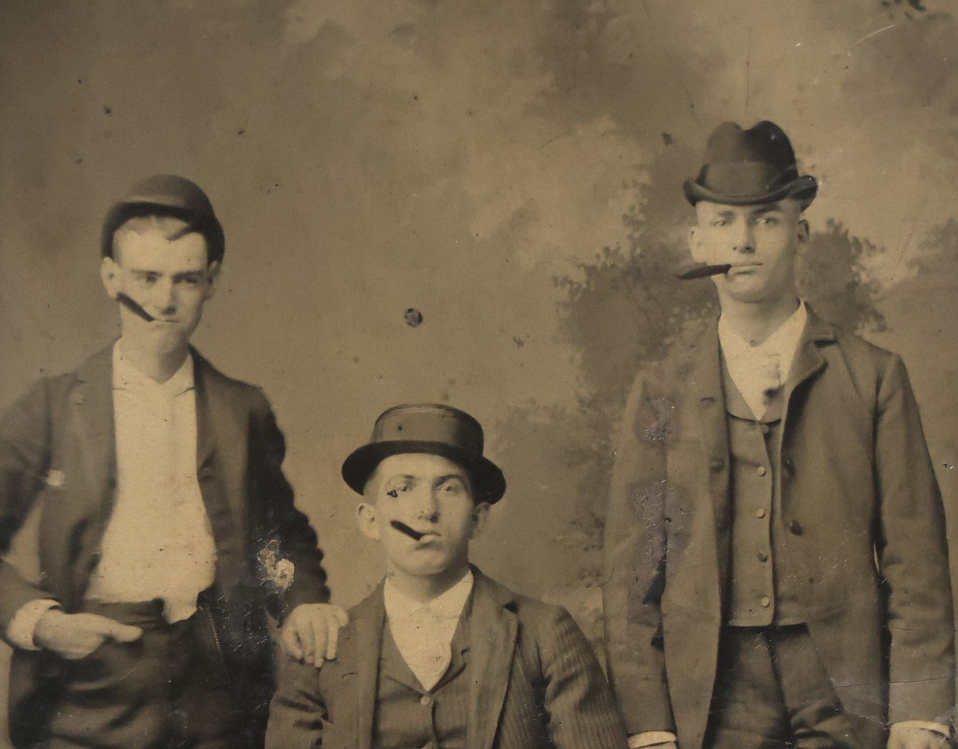 Lot 067 - Single Antique Tintype Photograph Of Three Men Smoking Cigars, In Hats