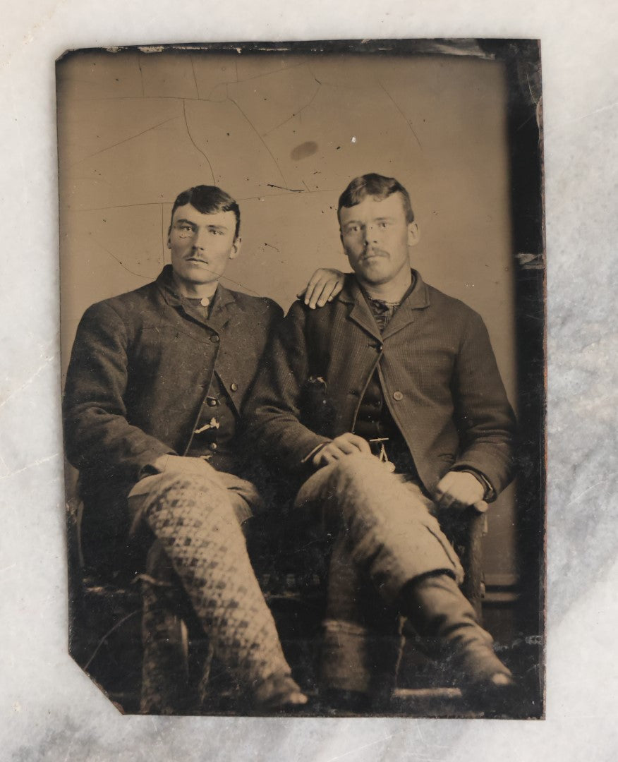 Lot 069 - Single Antique Tintype Photograph Of Two Men Posing In Embrace, Hand On Shoulder, Mustaches