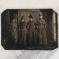 Lot 070 - Single Antique Tintype Photograph Of Four Handsomely Dressed Women In Long Coats, Landscape Orientation, Full Bodies In Shot
