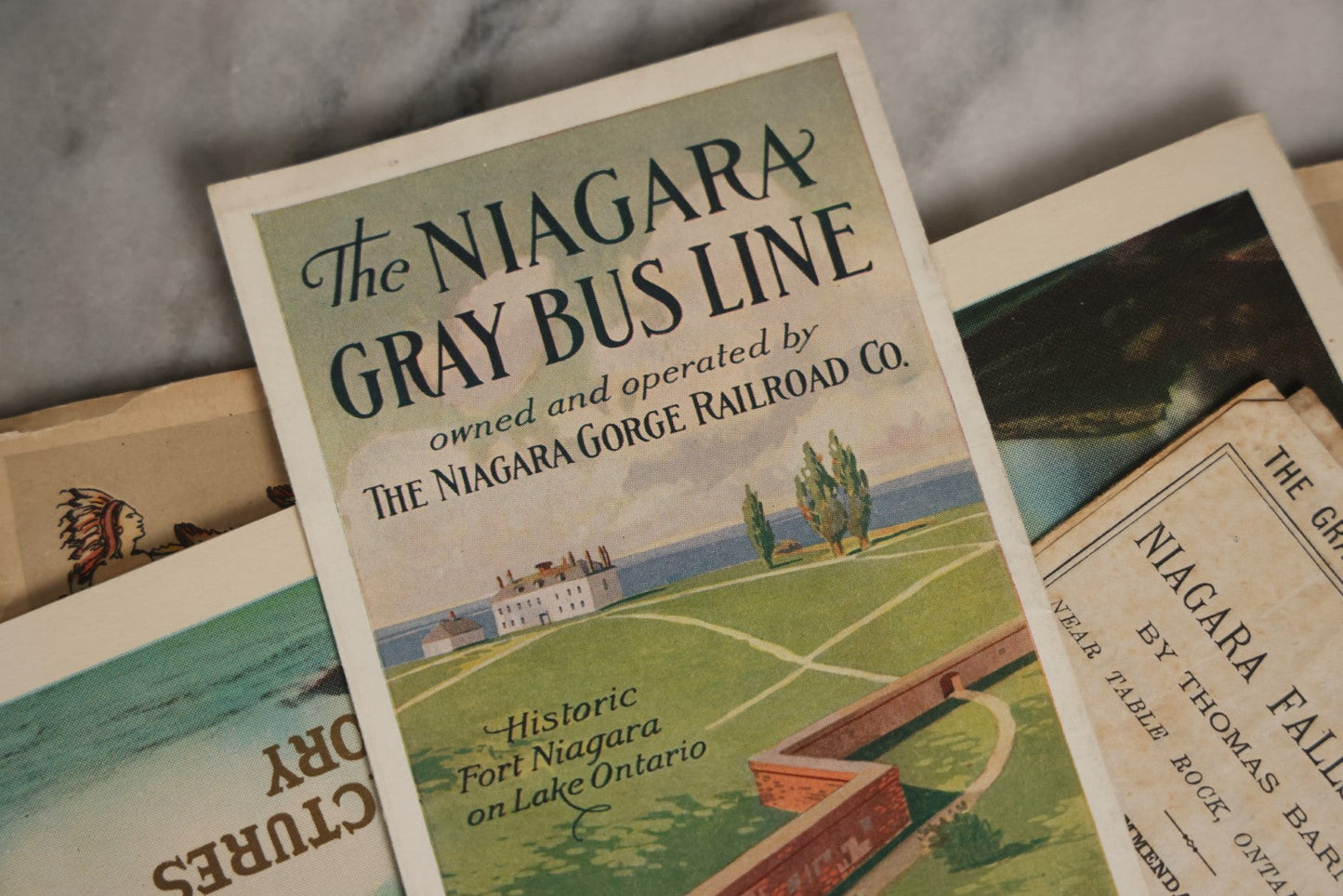 Lot 078 - Four Piece Ephemera Grouping, Niagara Falls Related, Including View Book, Gray Bus Line, Museum Brochure, And Colored Pictures And Story