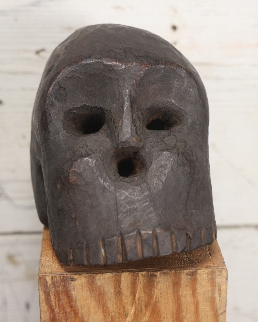 Lot 001 - Antique Folk Art Hand Carved Dark Wooden Skull, 4-1/2" x 6" x 5"