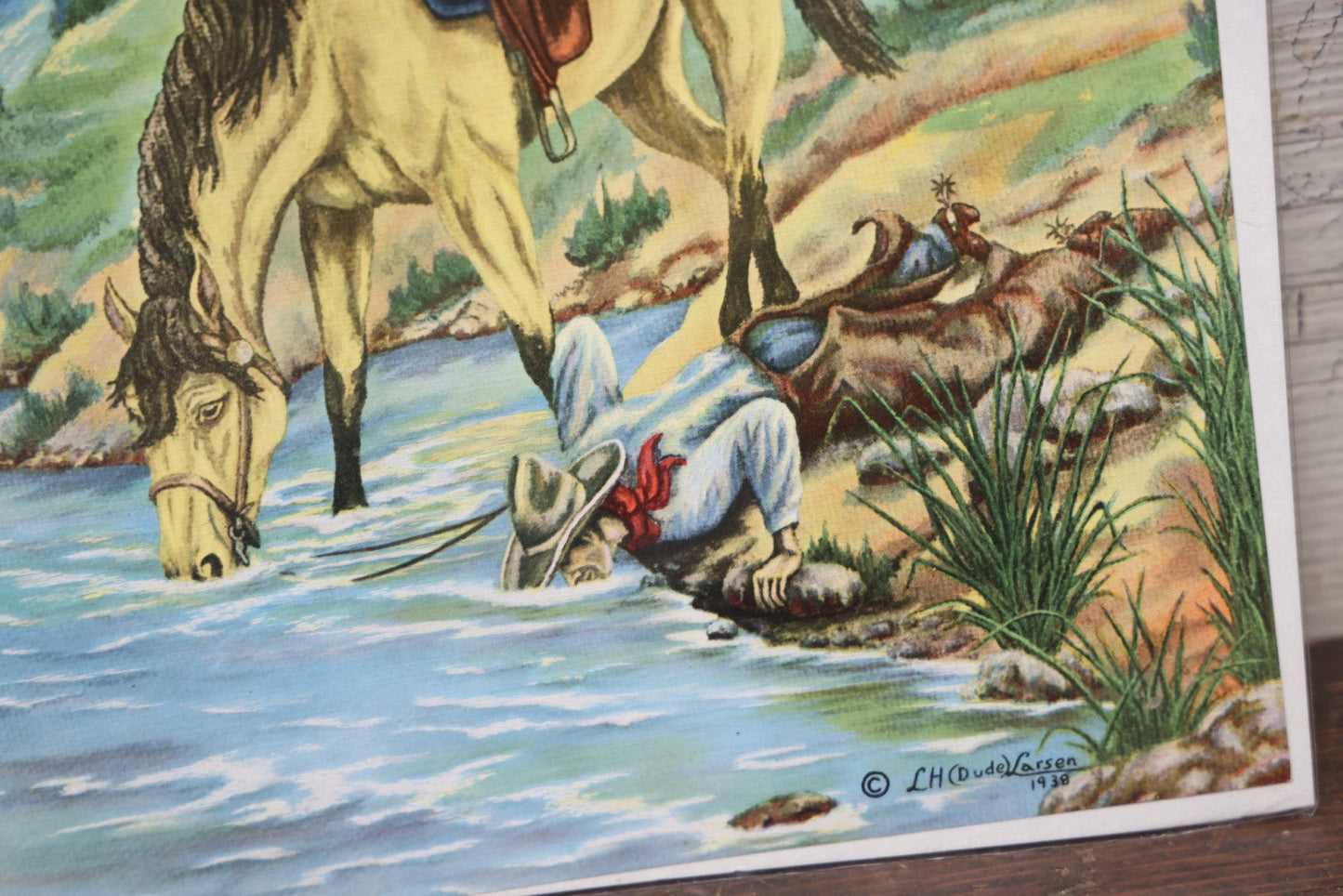 Lot 045 - Vintage Chromolithograph Poster, Western Cowboy Scene, "A Drink Of Water" By L.H. Dude Larsen, 1938