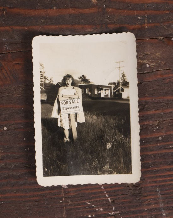 Lot 066 - Single Snapshot Photograph, Girl In Front Of For Sale Sign, Business In Background, Two Digit Phone Number