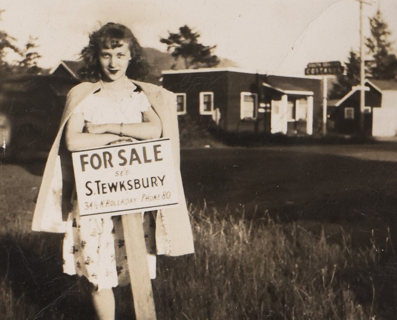 Lot 066 - Single Snapshot Photograph, Girl In Front Of For Sale Sign, Business In Background, Two Digit Phone Number