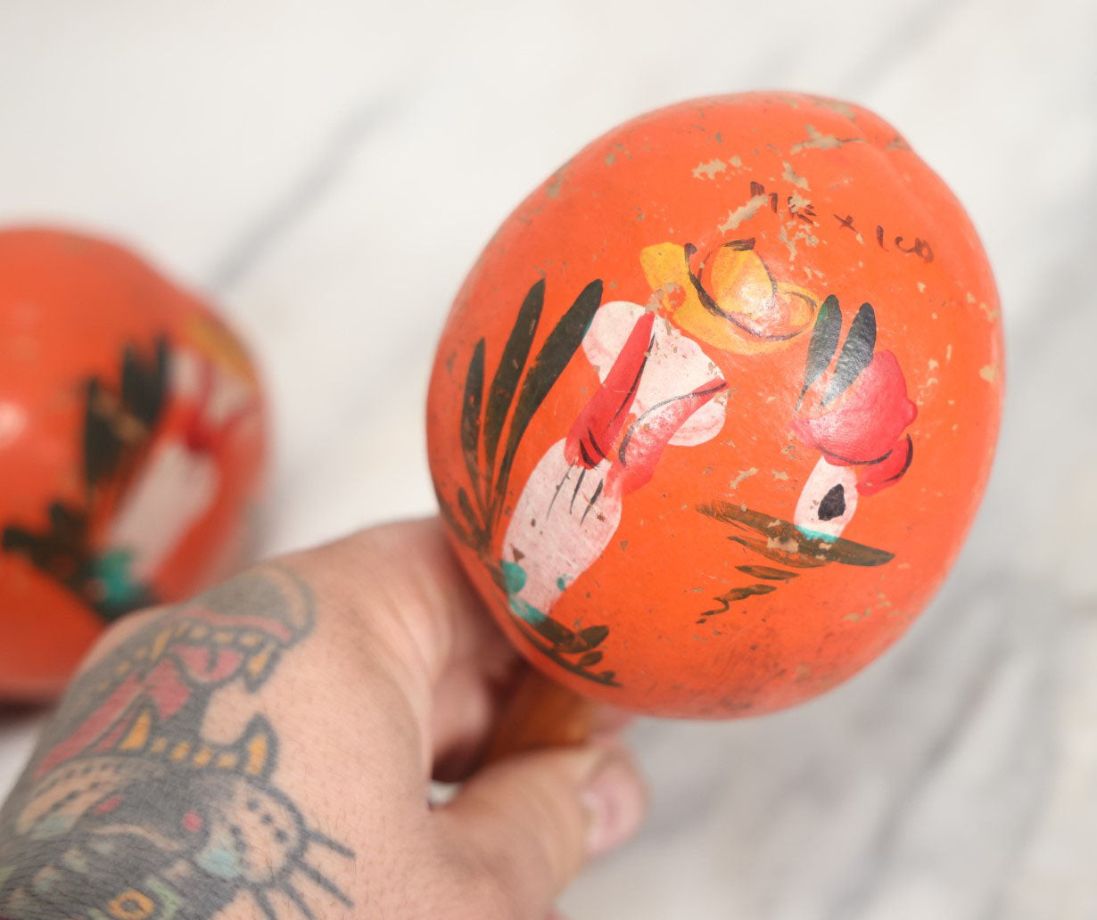 Lot 086 - Pair Of Vintage Hand Painted Orange Maracas, Souvenir Of Mexico, With Cactus, Man In Sombrero