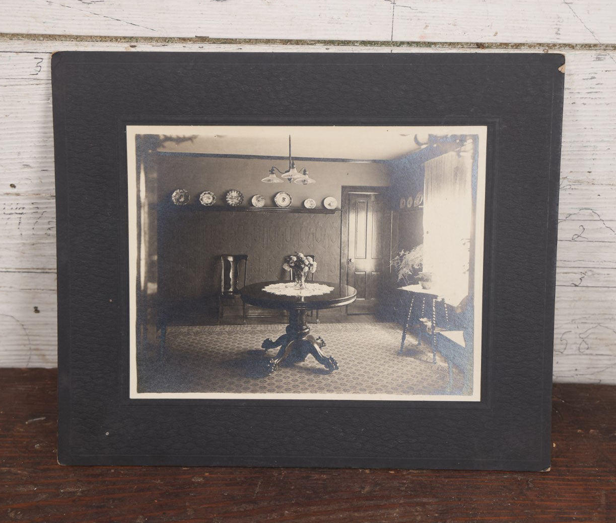 Lot 102 - Single Antique Boarded Photo, Dining Room Interior, With Early Electric Light Fixture