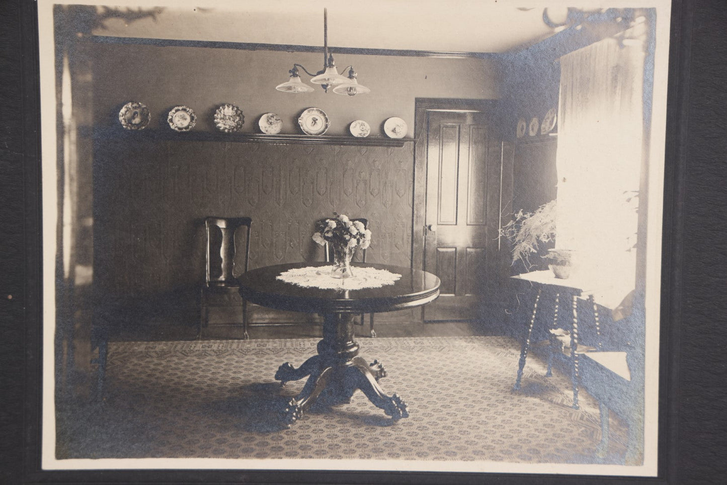 Lot 102 - Single Antique Boarded Photo, Dining Room Interior, With Early Electric Light Fixture