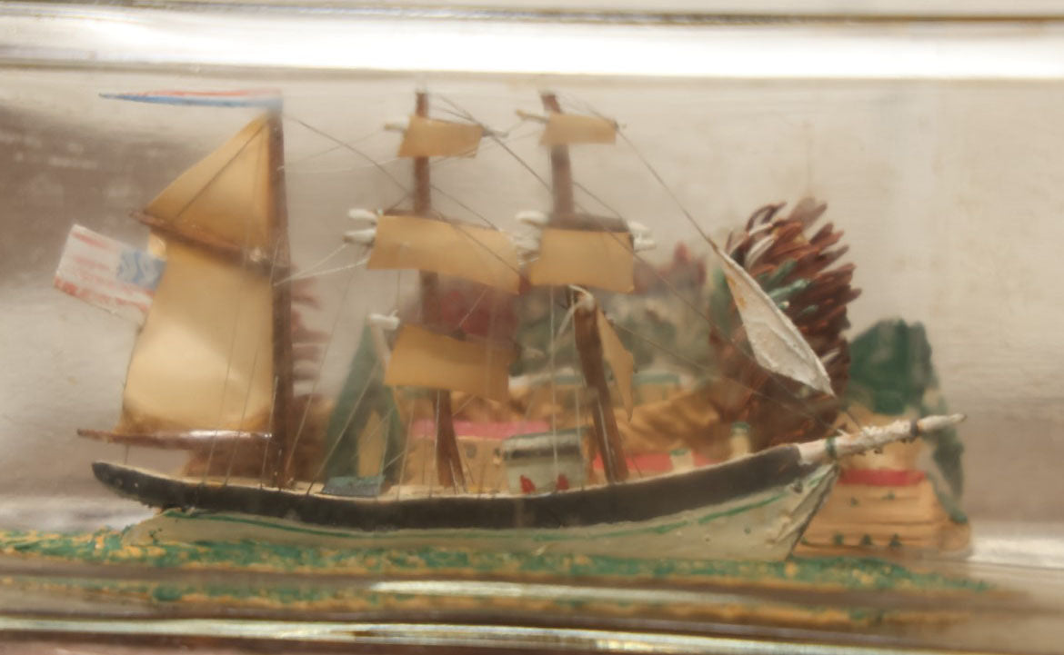 Lot 006 - Vintage Folk Art Ship In A Bottle, Handcrafted With Backdrop, Ship Has American Flag, Circa 1930