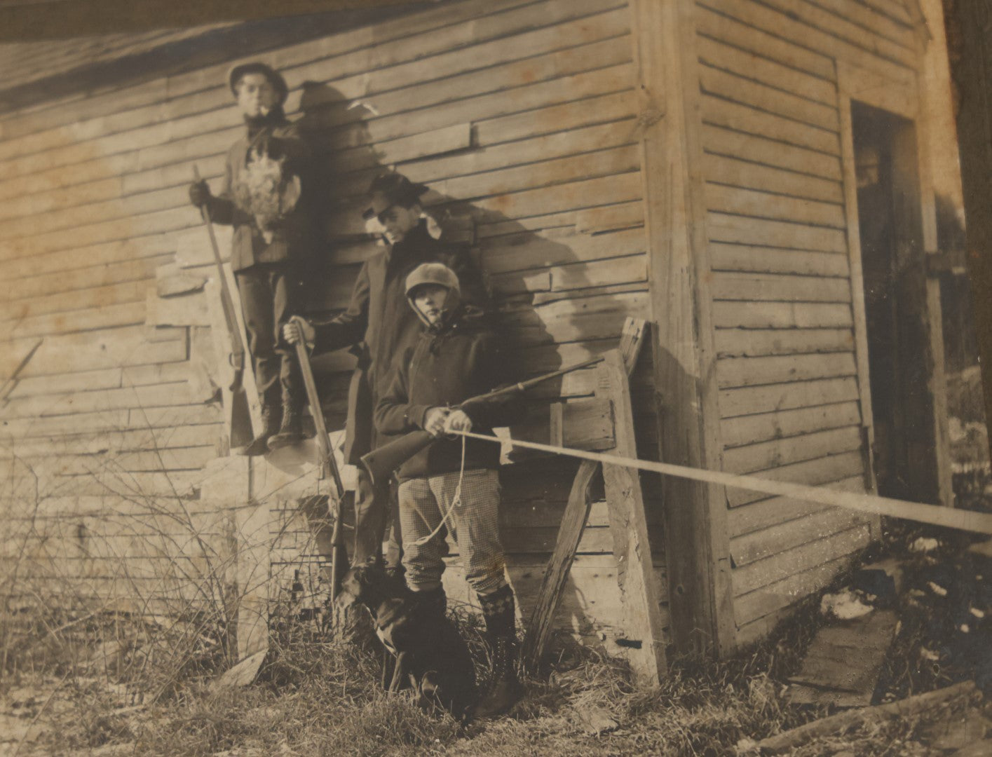 Lot 015 - Antique Boarded "Selfie" Photo Of Three Young Hunters With The Day'S Catch, Note Boy Pulling String To Activate Shutter, Early Self Portrait Photo