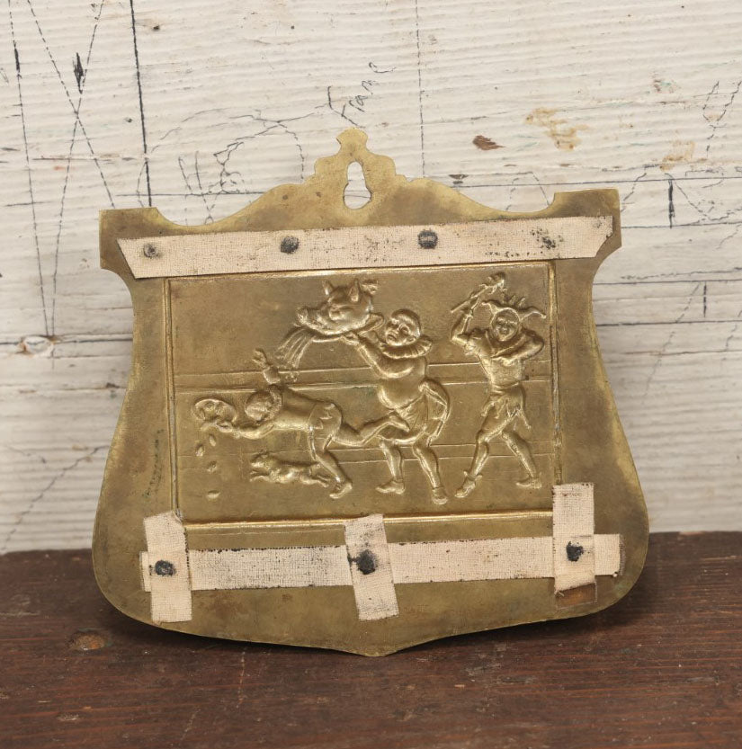 Lot 038 - Antique Pressed Brass Tobacco Pipe Rack With Court Jester, Pig'S Head On Platter, Dog, Etc, Comic Scene, Wall Mountable, Space For 4 Pipes
