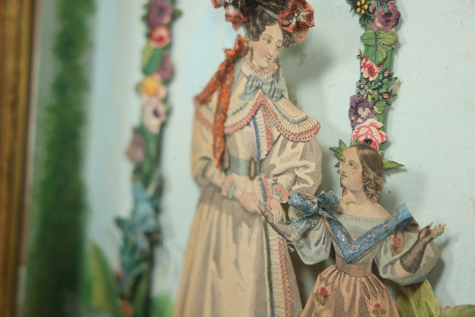 Lot 049 - Antique Hand Colored Ephemera Diorama Of Woman And Daughter, In Modern Frame Behind Glass, Hand Painted Backdrop