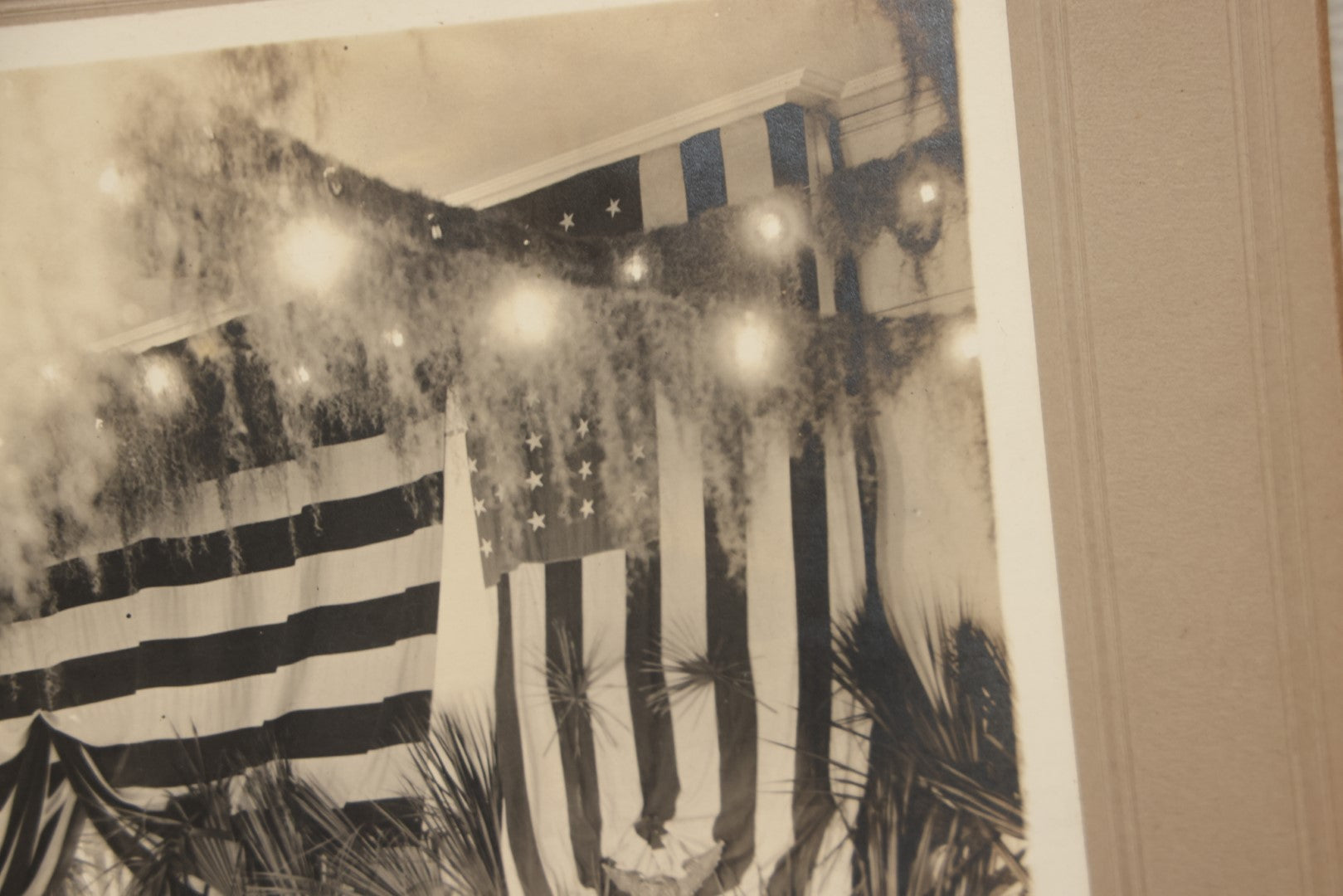 Lot 062 - Antique Boarded Photograph Of American Flags, Bunting, Palms, Unknown Location