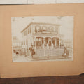 Lot 063 - Antique Boarded Photograph Of Wisconsin House, Possible Inn, With Many Men, Women, And Children On Porch, On Roof