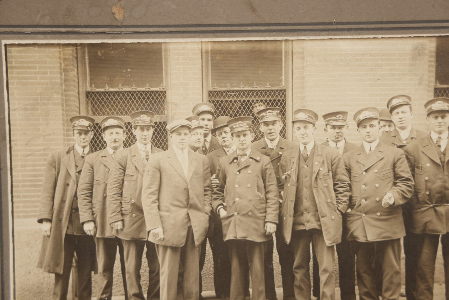 Lot 064 - Antique Boarded Occupational Group Photograph, Men In Uniform, Train Conductors, Note Losses To Board