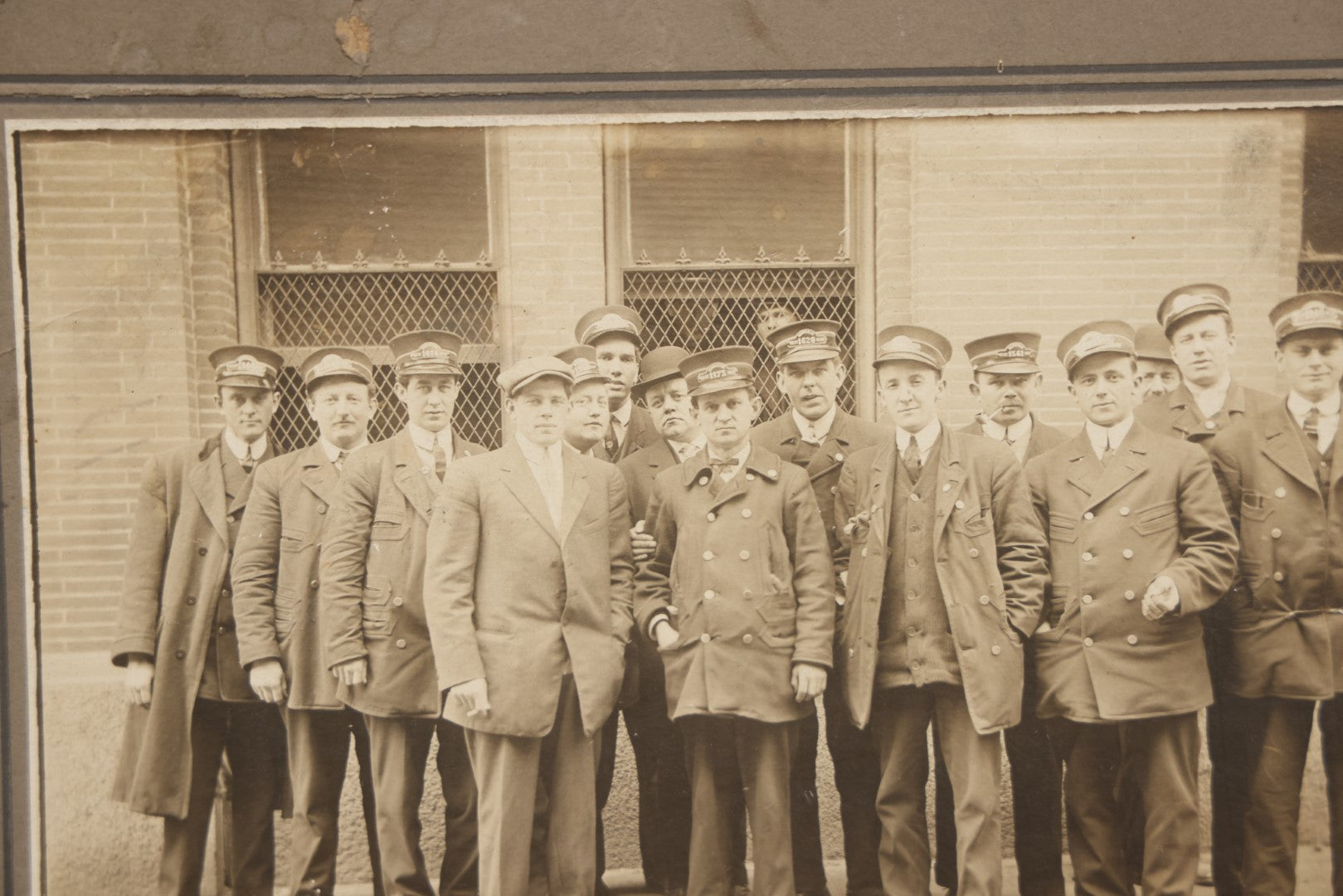 Lot 064 - Antique Boarded Occupational Group Photograph, Men In Uniform, Train Conductors, Note Losses To Board
