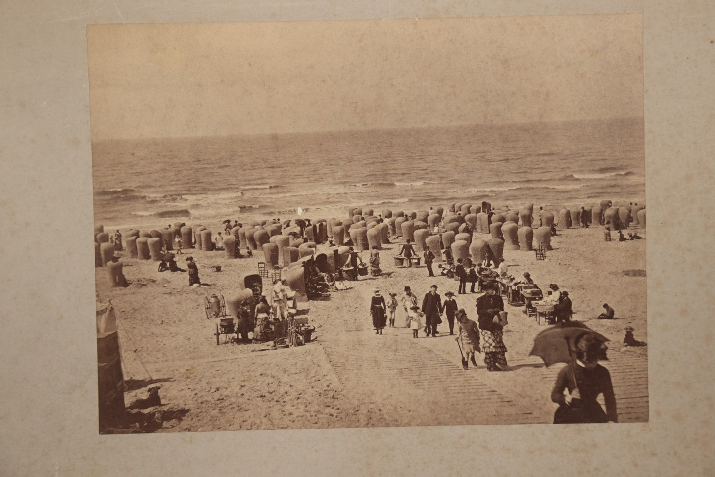 Lot 069 - Antique Boarded Photograph Of Victorian Beach Goers, Beach Covered In Private Tents, Scheveningen Beach, The Netherlands