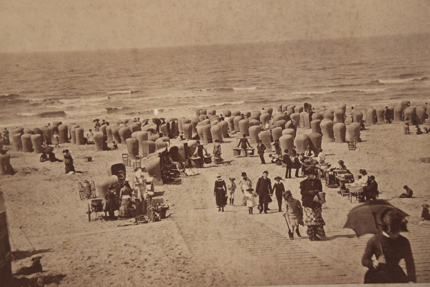 Lot 069 - Antique Boarded Photograph Of Victorian Beach Goers, Beach Covered In Private Tents, Scheveningen Beach, The Netherlands